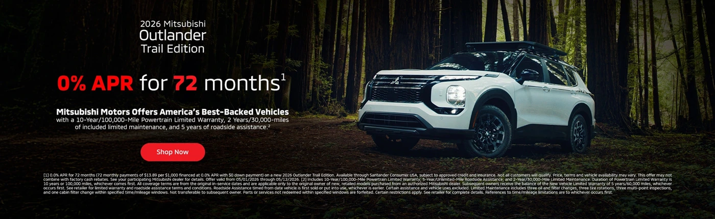 A white 2026 Mitsubishi Outlander Trail Edition sits on a forest road in a dark woodland ad, promoting 0% APR for 72 months.